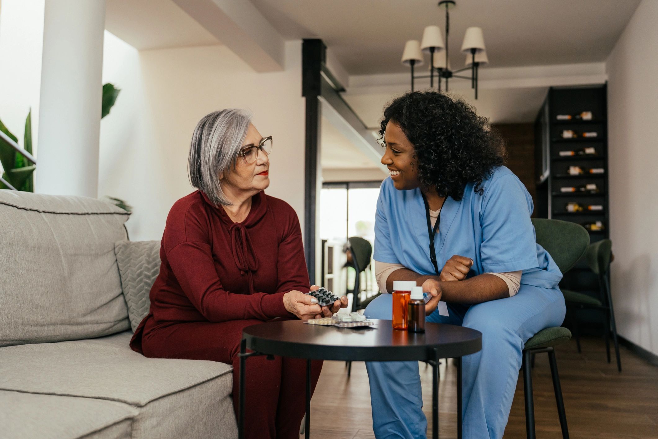 Elderly woman smiling at home